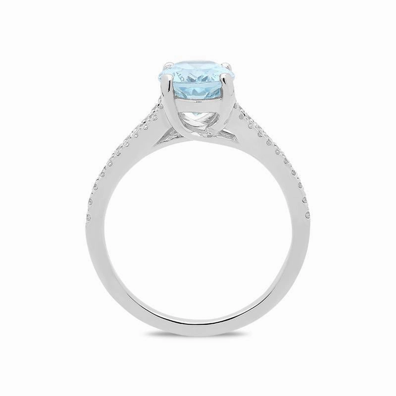 18ct White Gold Aquamarine and Diamond Oval Cut Ring